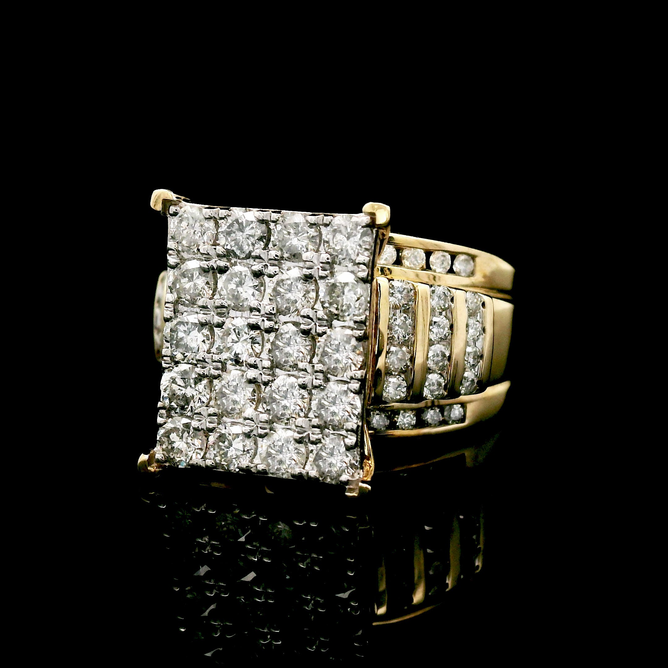 Gold ring with diamond square cluster on a black background right